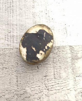 Relicario antiguo con figura