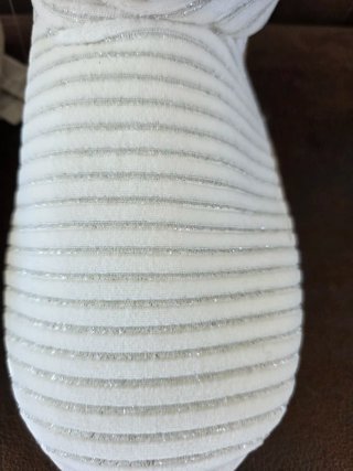 Botas de casa blancas con brillos.