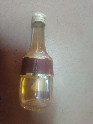 Botellitas vintage: Curacao y figura
