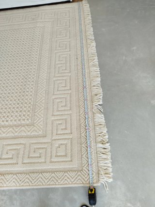 Alfombra de lana beige para salón