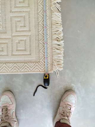Alfombra de lana beige para salón
