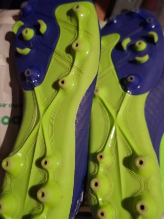 Botas de fútbol  niño azules y verdes, talla 36