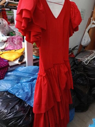 Traje de flamenca rojo volantes