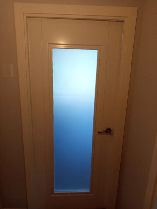 Puerta madera y cristal