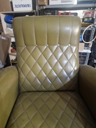 Poltrona oscillante vintage in pelle verde