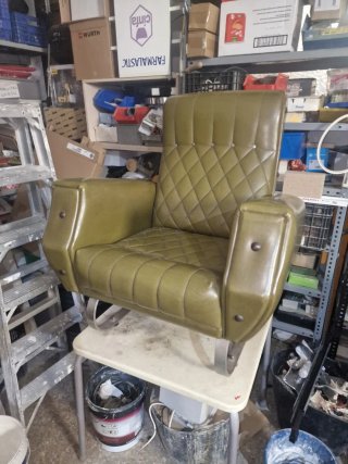 Poltrona oscillante vintage in pelle verde
