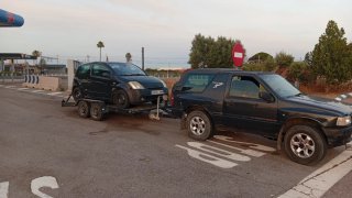 Transporte vehículos con remolque plataforma