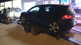 Transporte vehículos con remolque plataforma