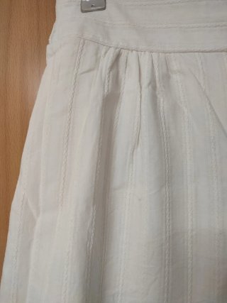 Pantalón crema pata ancha