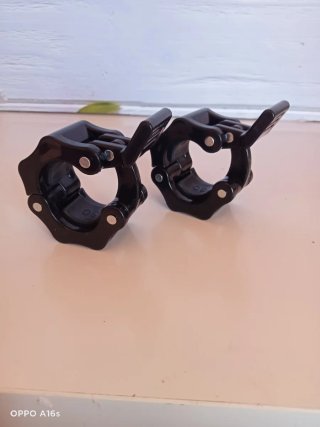 Abrazaderas para barra de pesas