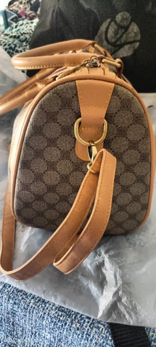 Bolso de mano estampado, medidas 30x23x18 cm