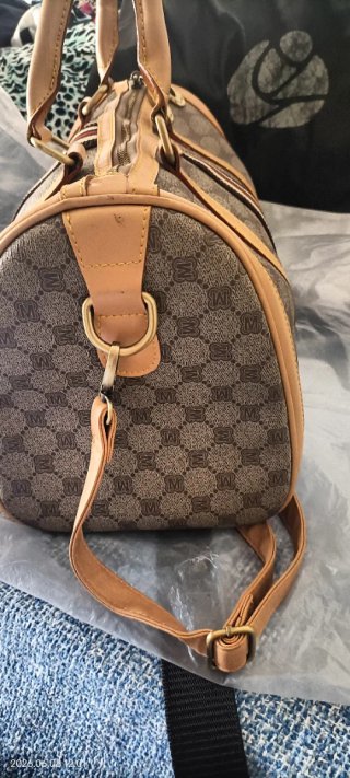 Bolso de mano estampado, medidas 30x23x18 cm