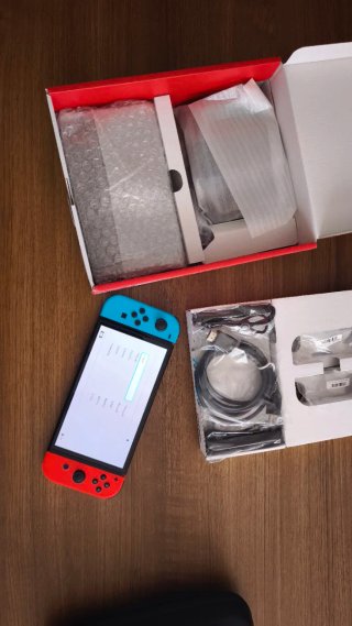 Nintendo Switch OLED + Accessori + Regalo