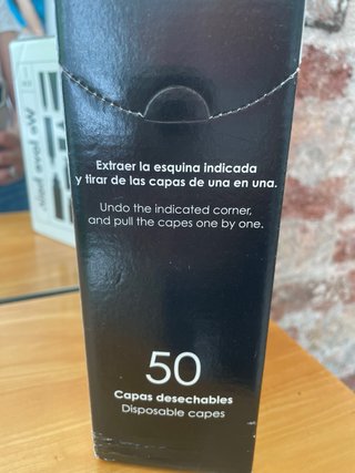 Capas peluquería KIN desechables.