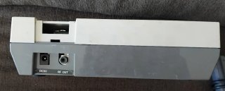 Consola Nintendo NES con pistola y mandos