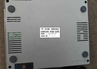 Consola Nintendo NES con pistola y mandos