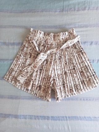 Gonna pantalone plissettata vita alta