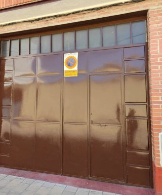 Puerta de garaje hierro 2 hojas manual