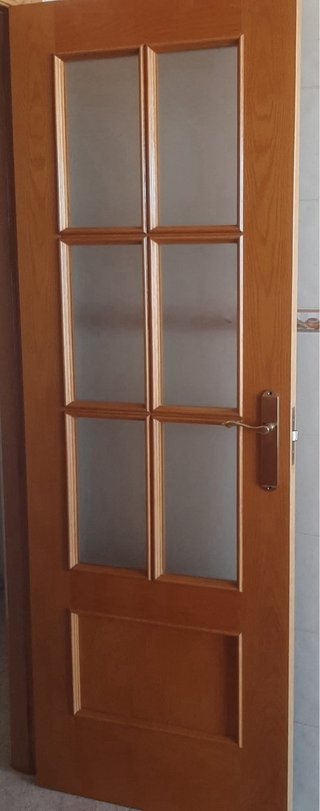 Puerta de roble macizo con cristal