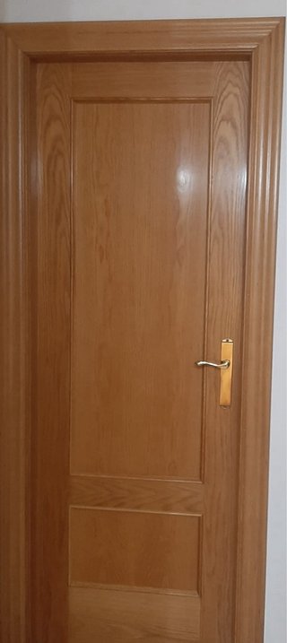 Puerta de roble macizo con cristal