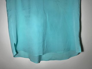 Blusa azul turquesa bordada sin mangas Talla M