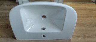 Lavabo de cerámica blanco