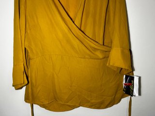 Blusa ALMA manga larga XL nueva