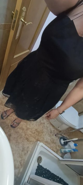 Vestido negro corto con lentejuelas