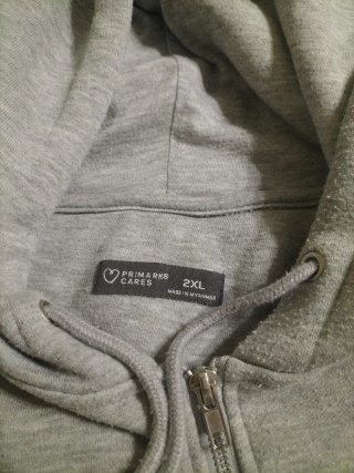 Chaqueta con cremallera gris sin usar