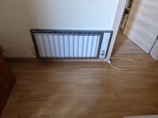 Estufa eléctrica gris y blanca
