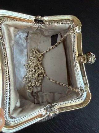 Bolso de fiesta plateado con pedrería