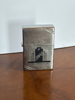 Zippo Plateado con Diseño A Weeks Trial