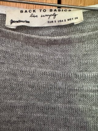 Blusa doble capa gris y blanca