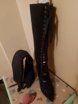 Botas altas azules con cordones