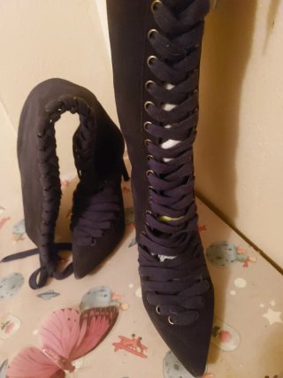 Botas altas azules con cordones