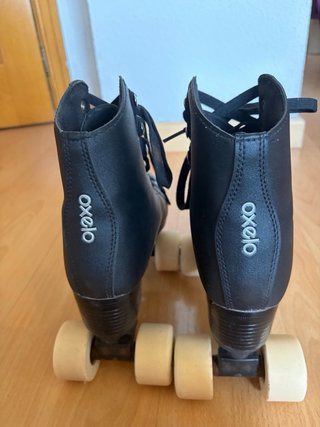 Patines Oxelo negros talla 38 y casco como nuevos