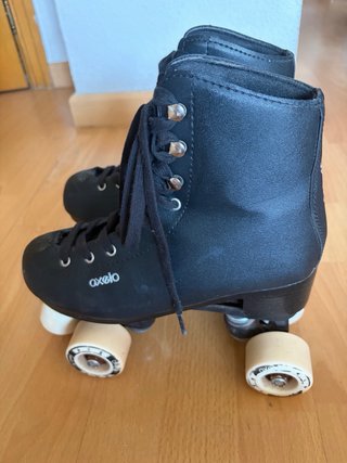 Patines Oxelo negros talla 38 y casco como nuevos