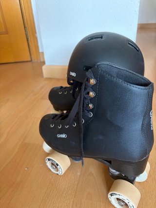 Patines Oxelo negros talla 38 y casco como nuevos