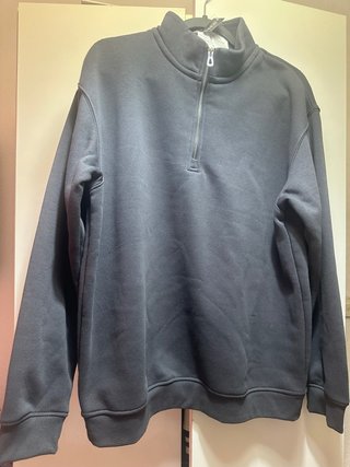 Sudadera negra con cremallera 1/4
