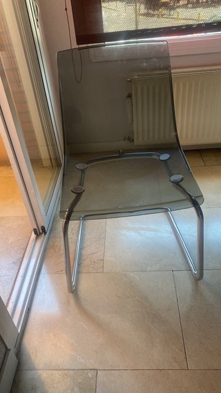 Silla transparente Ikea gris metal y plástico