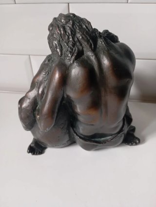 Escultura latón
