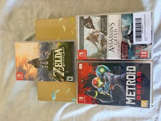 Nintendo Switch OLED + Giochi Zelda e Metroid