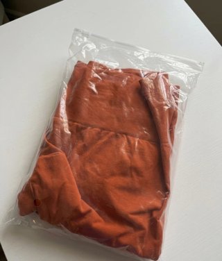Mallas deportivas verdes y naranjas