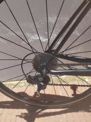 Bici Carretera Megamo Negra y Amarilla