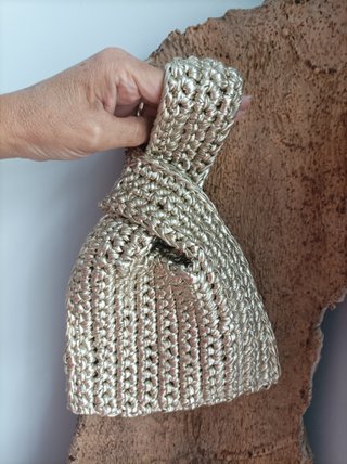 Bolso Color oro blanco. Contiene lycra