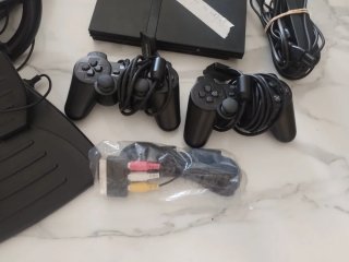 PlayStation 2 Slim + Volante Ferrari
