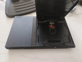PlayStation 2 Slim + Volante Ferrari