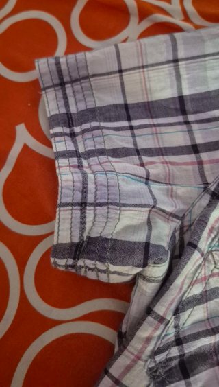 Camisa reversible manga corta.