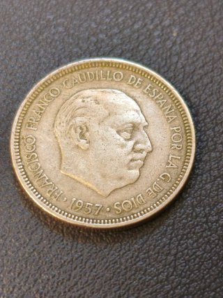 Moneda 5 Pesetas 1957 con error acuñación espejo.