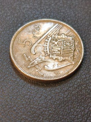 Moneda 5 Pesetas 1957 con error acuñación espejo.